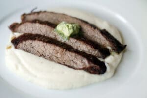 Flank steak with blue cheese cauliflower puree