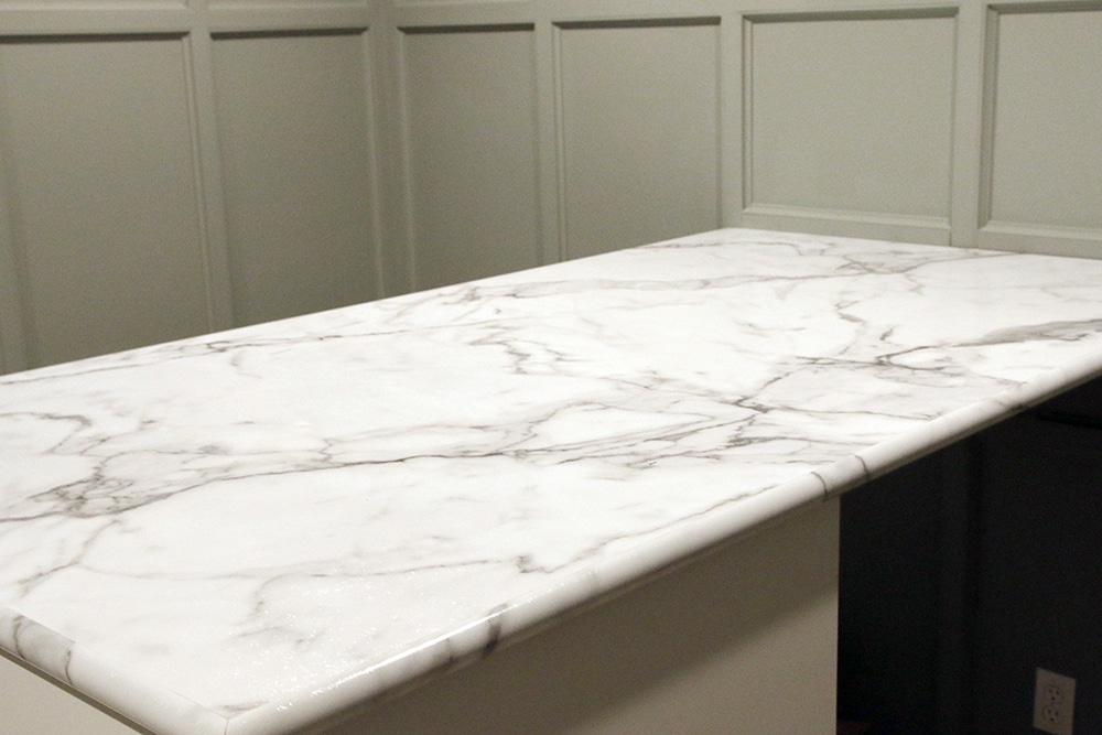Our Calacatta Marble countertop by Formica in the Home Office-Yeah, That's - Chris Loves Julia