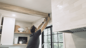 Installing Faux Wood Beams on Your Ceiling: Adding the brackets