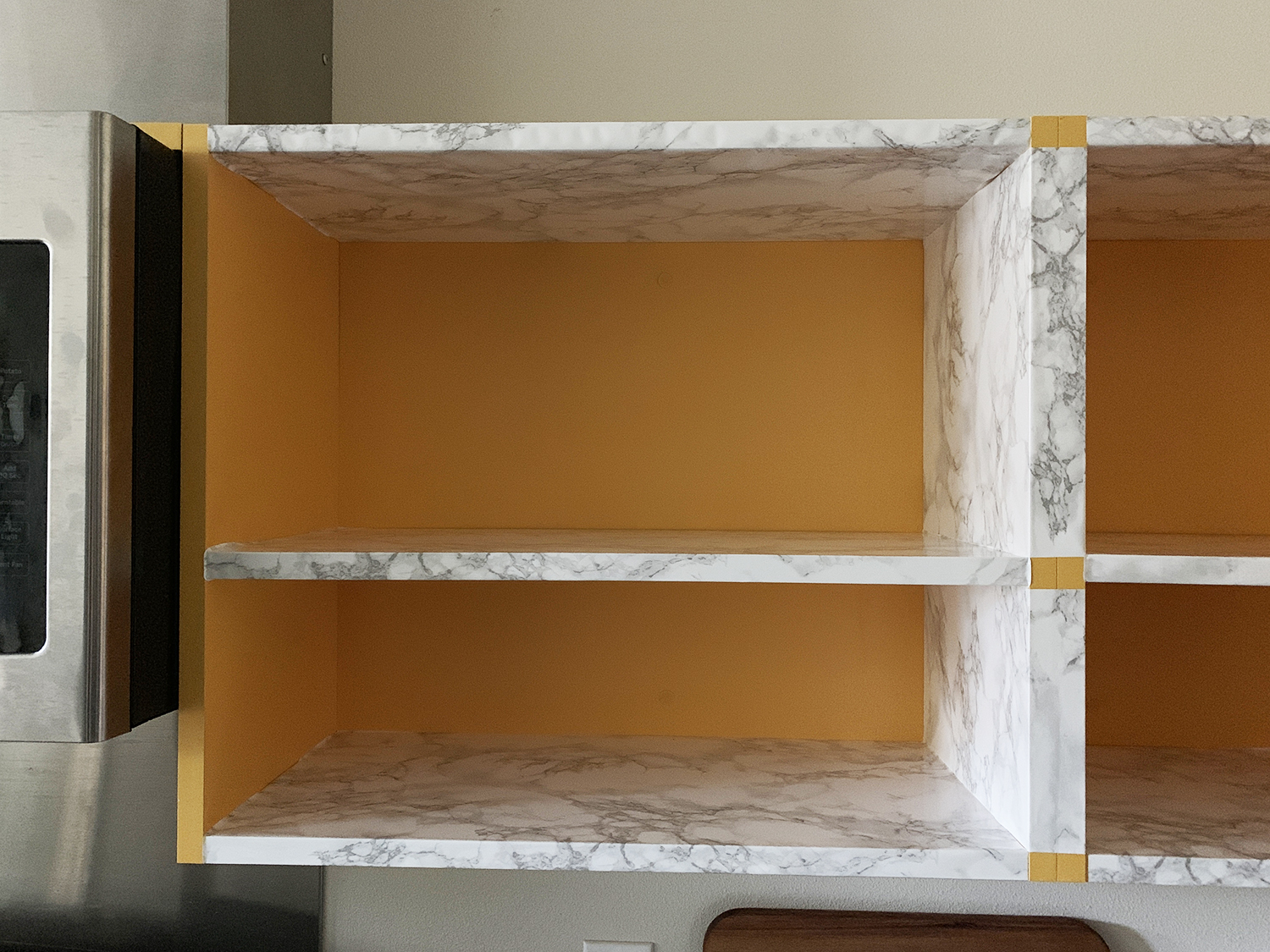 How to Update an Old Kitchen Shelf with Contact Paper