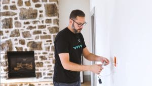 Running cables through a wall