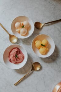 Three frozen desserts in pretty pastel colors