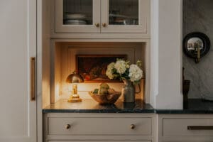 Brass lamp glowing on a kitchen countertop