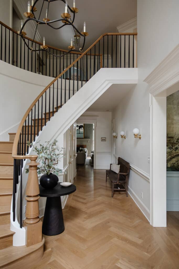 Chris Loves Julia | Front entryway featuring a wood floor