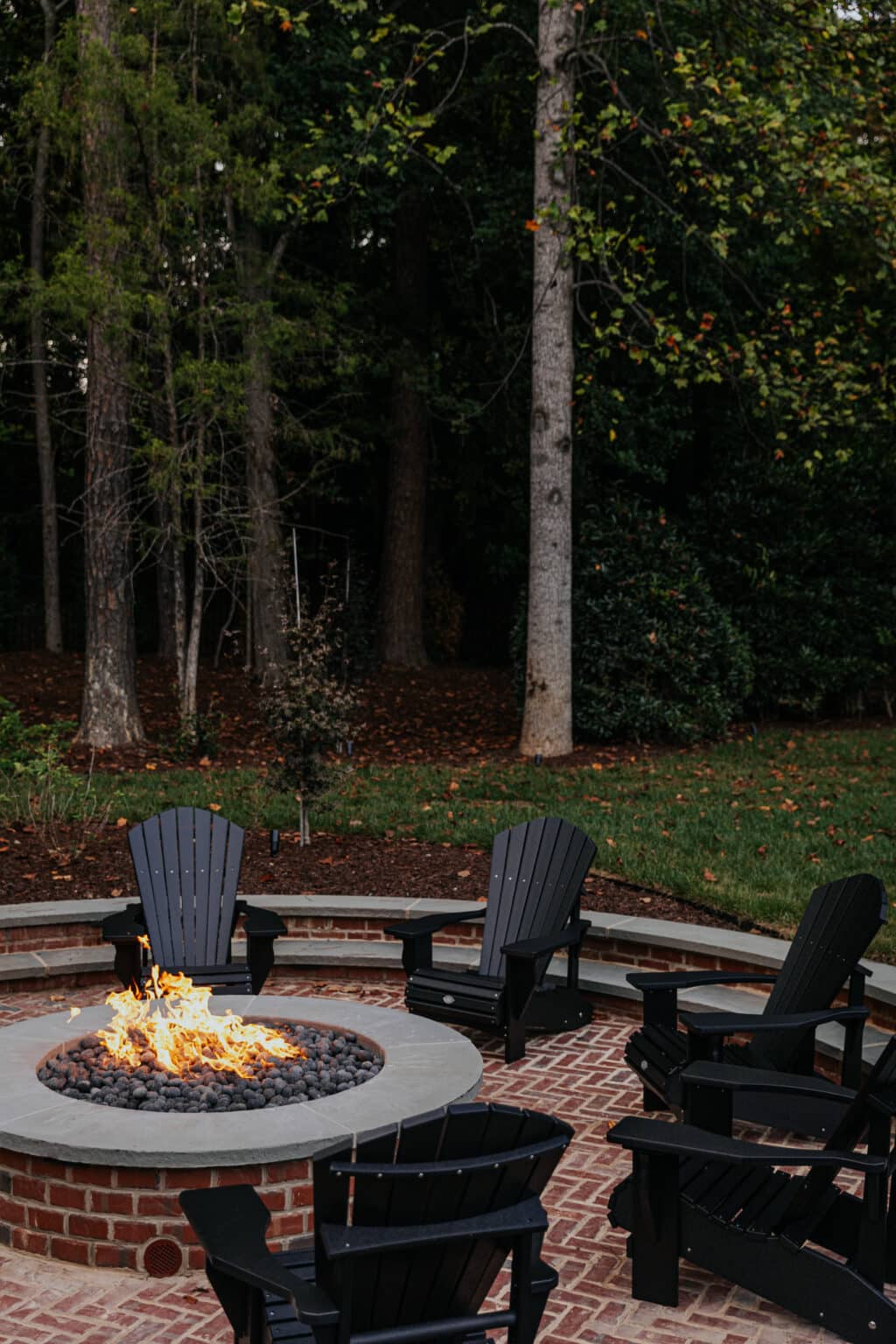 Our Sunken Fire Pit Paired With Black Adirondack Chairs   061A2922 1024x1536 