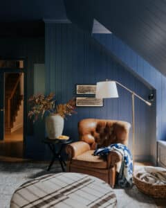 Cozy blue bonus room with fall decor