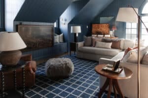 Blue bonus room with blue & white grid rug