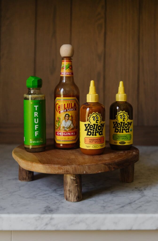 Chris Loves Julia | Chris' favorite hot sauces: Cholula Hot Sauce, Truff Jalapeno Lime Hot Sauce, Yellow Bird Serrano Hot Sauce, Yellow Bird Habenero Hot Sauce