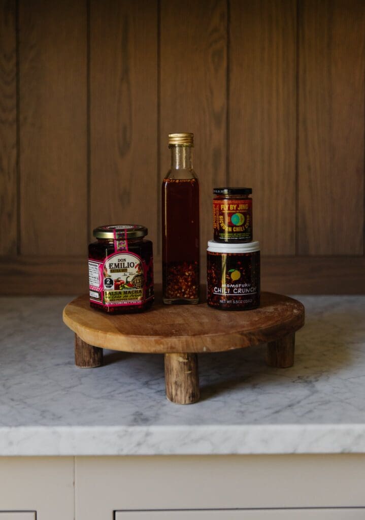 Chris Loves Julia | Chris' favorite chili crisp oils including Momofuku Chili Crunch, Fly by Jing Sichuan Chili Crisp, Don Emilio Salsa Macha