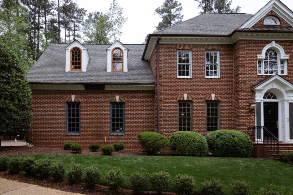 Sampling exterior paint trim on windows: Homburg Gray and Cromwell Gray