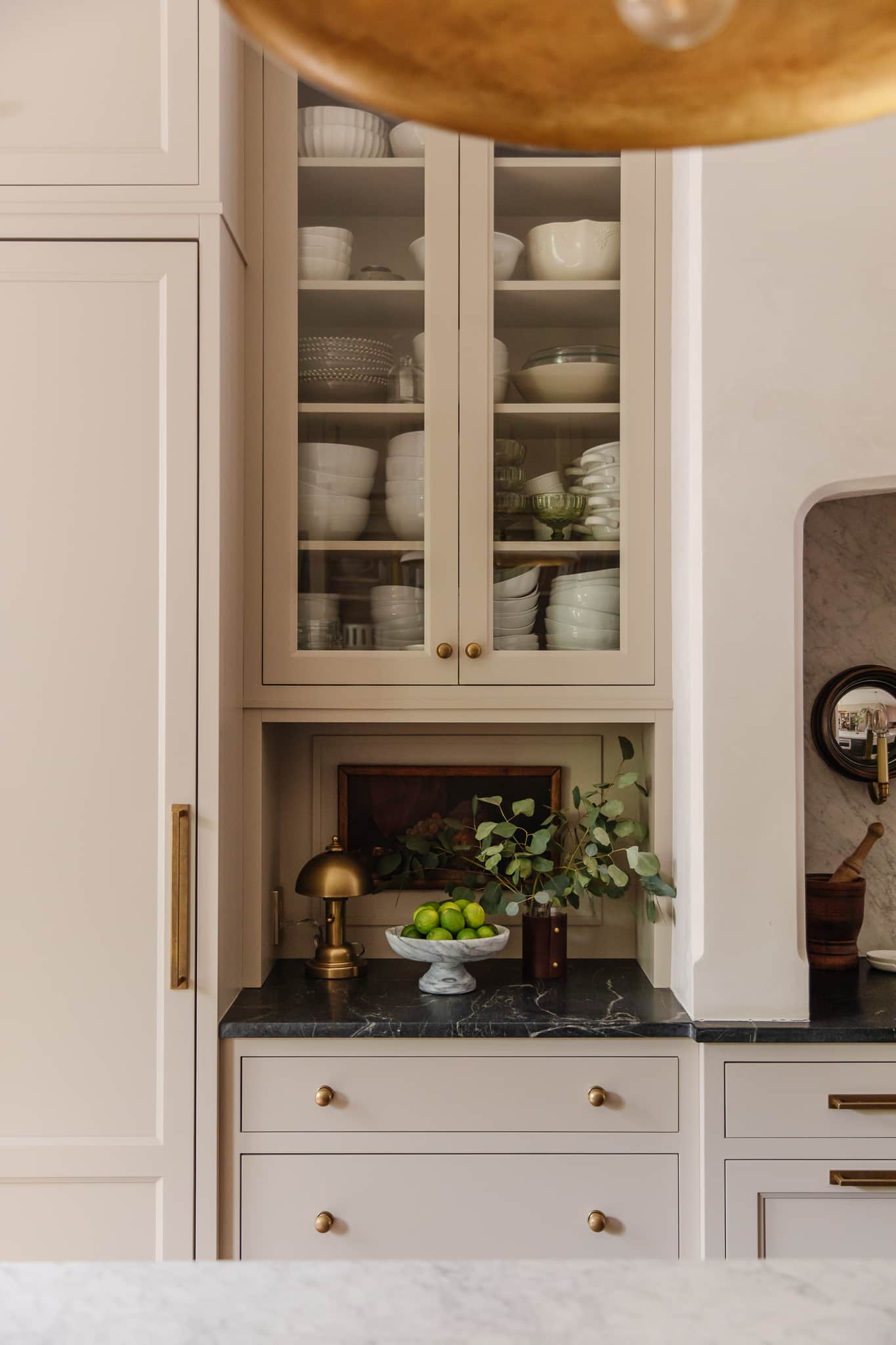Chris Loves Julia | Kitchen nook with glass cupboards. 