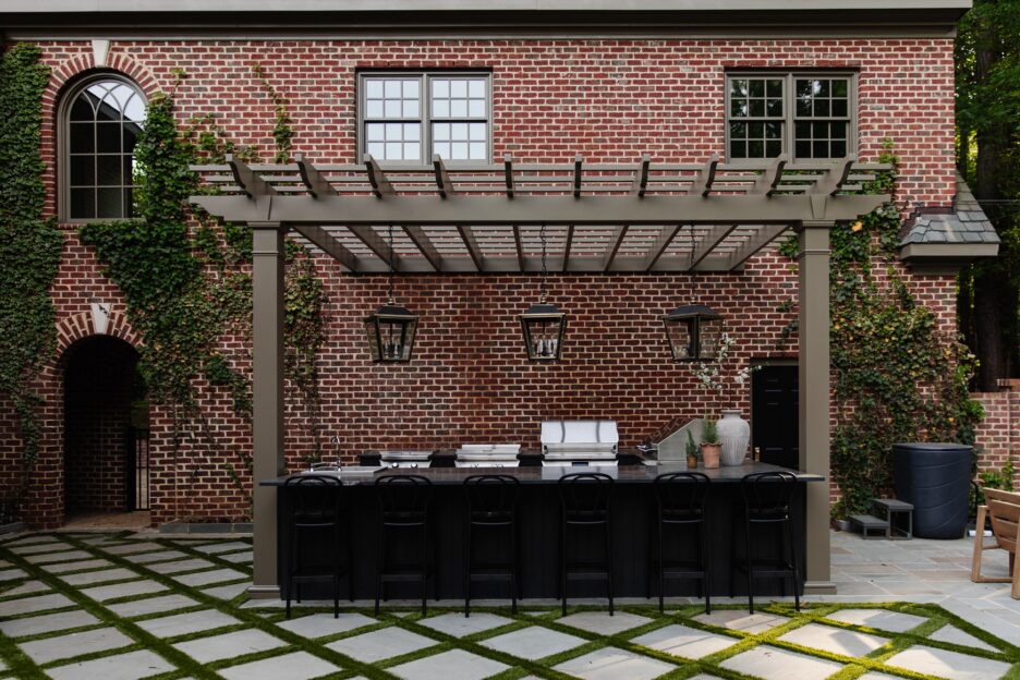 Moody brown pergola over an outdoor kitchen