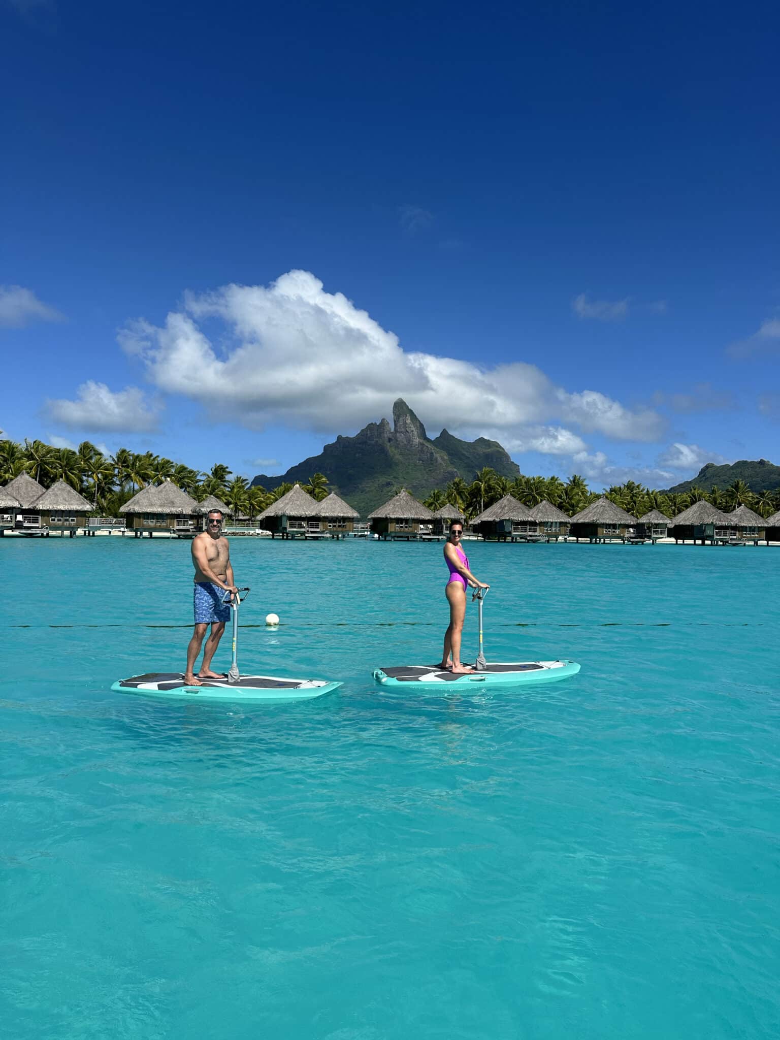 Chris Loves Julia | Paddle boarding at the St. Regis in Bora Bora