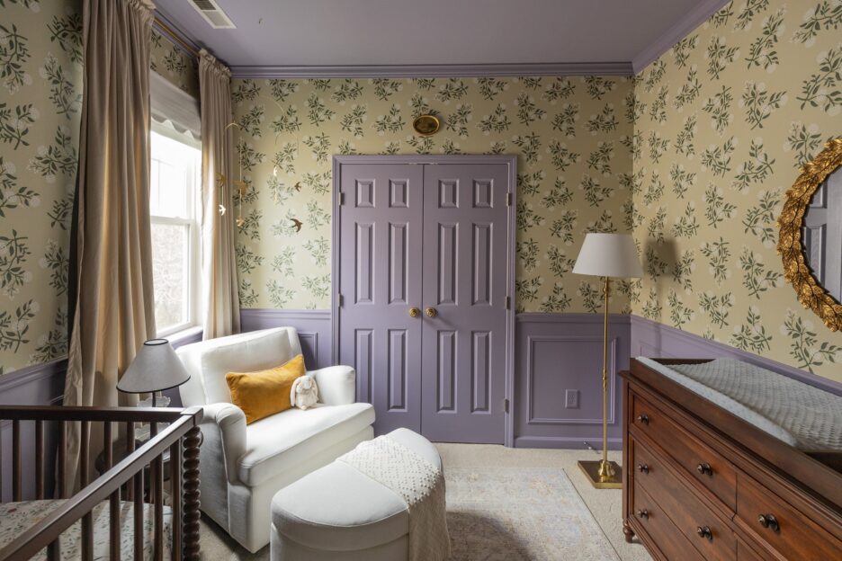Gigi's nursery with soft lavender paint colors on the closet and a cozy ottoman