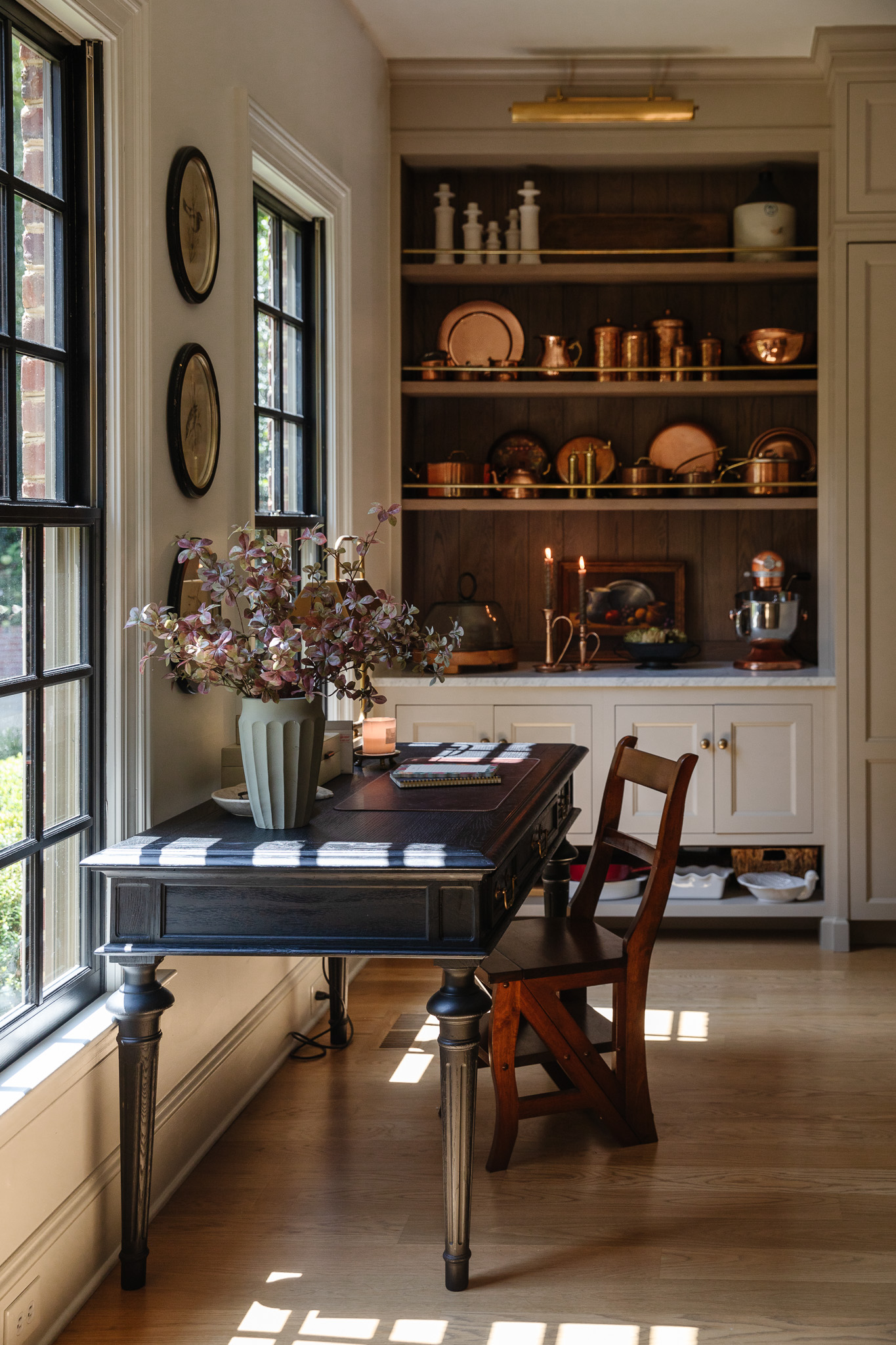 Chris Loves Julia | Fall stems on the kitchen desk in a gray vase