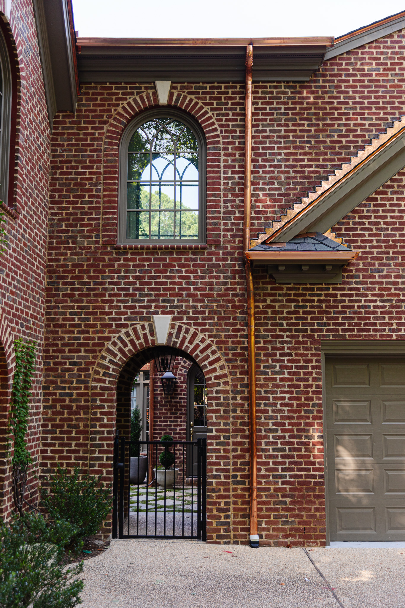 Chris Loves Julia | Traditional brick house with barrel downpipe gutters 