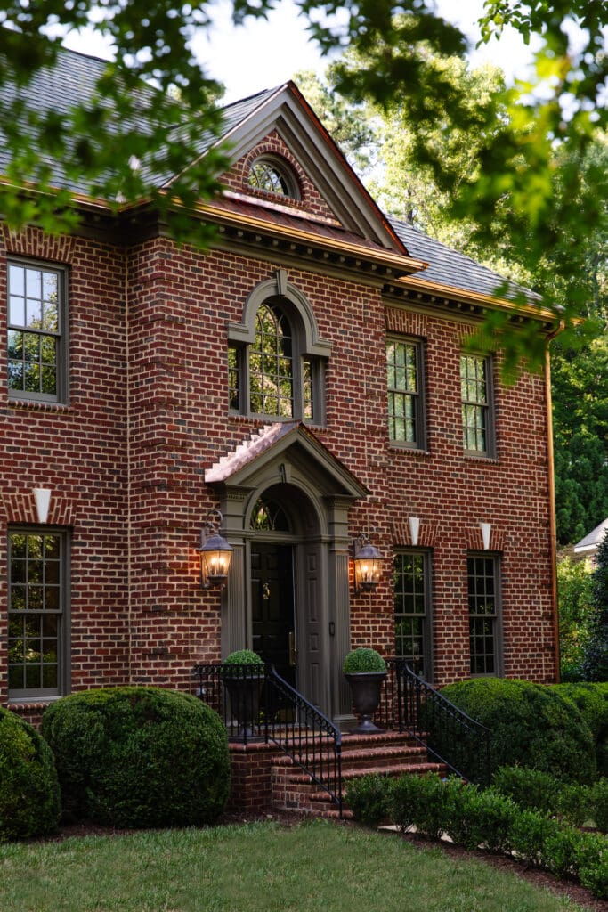 Traditional brick house with new copper gutters and flashing