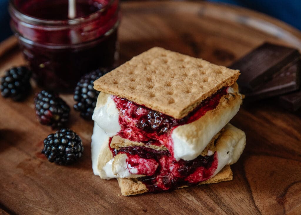 S'mores with a blackberry jam oozing over the side