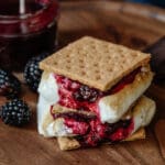 S'mores with a blackberry jam oozing over the side