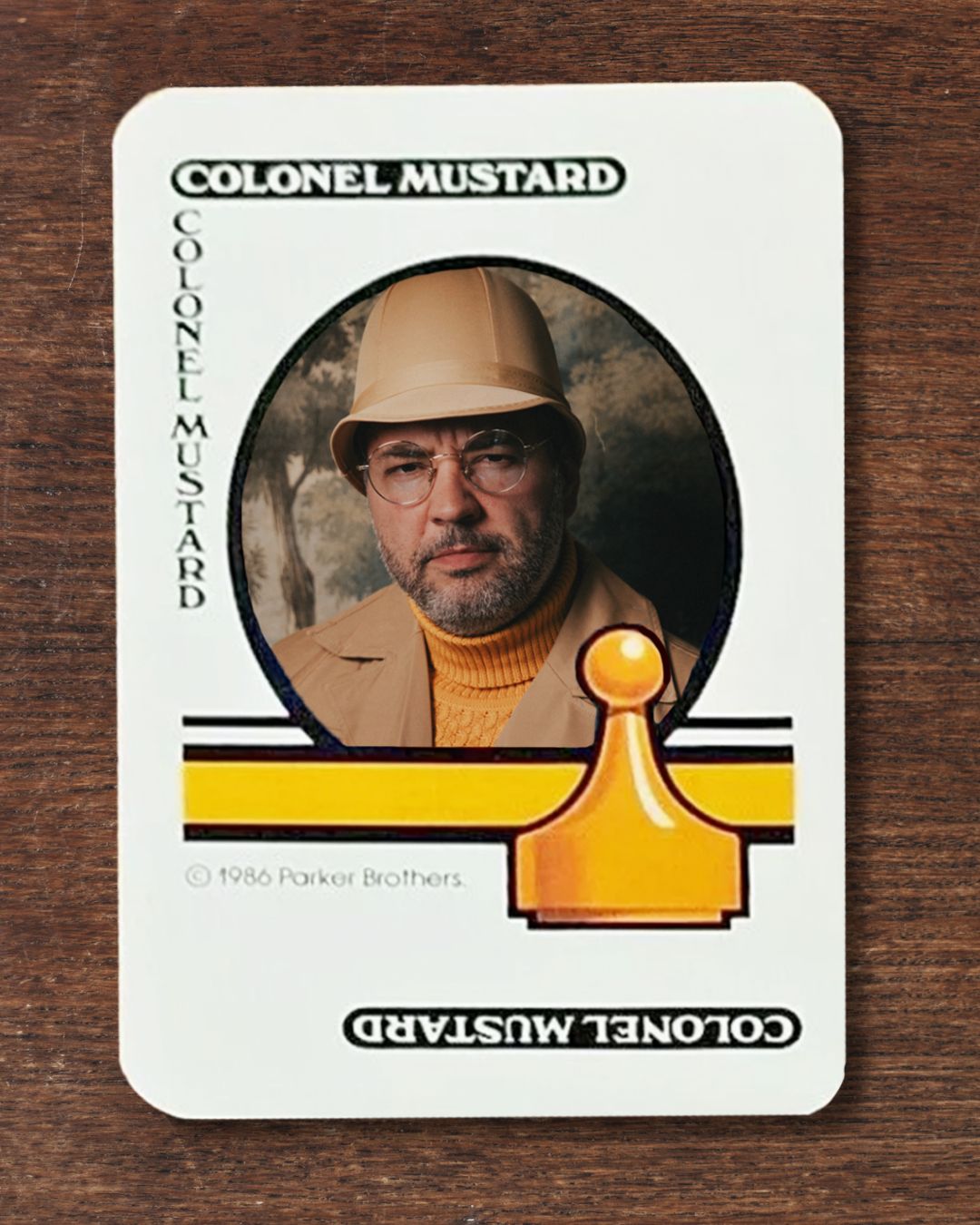 Chris dressed as Colonel Mustard on a classic playing card from Clue: The Game.