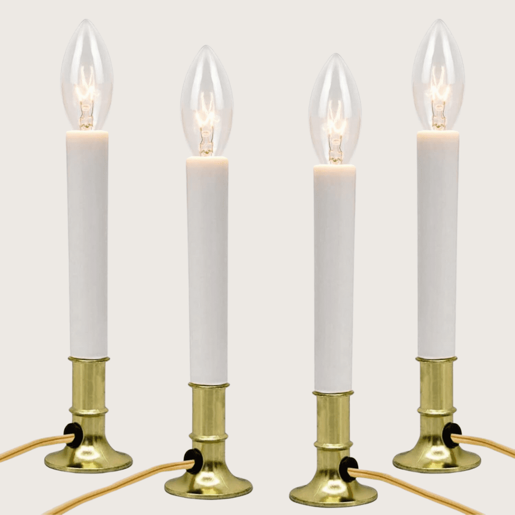 4 plug-in window candles with brass bases