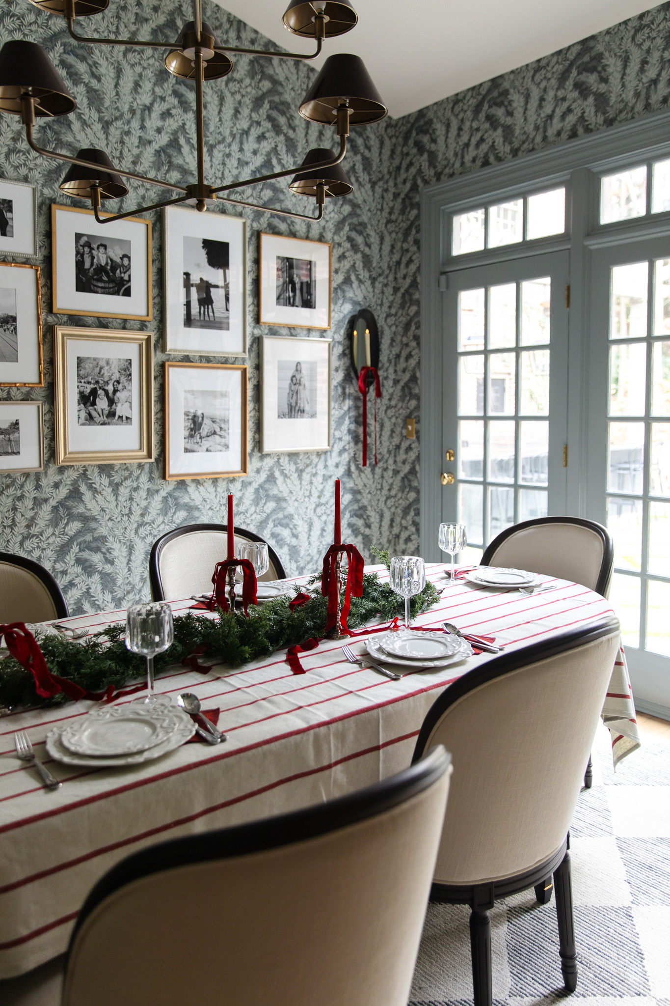 A bright winter tablescape for the holidays with traditional red, white and green colors