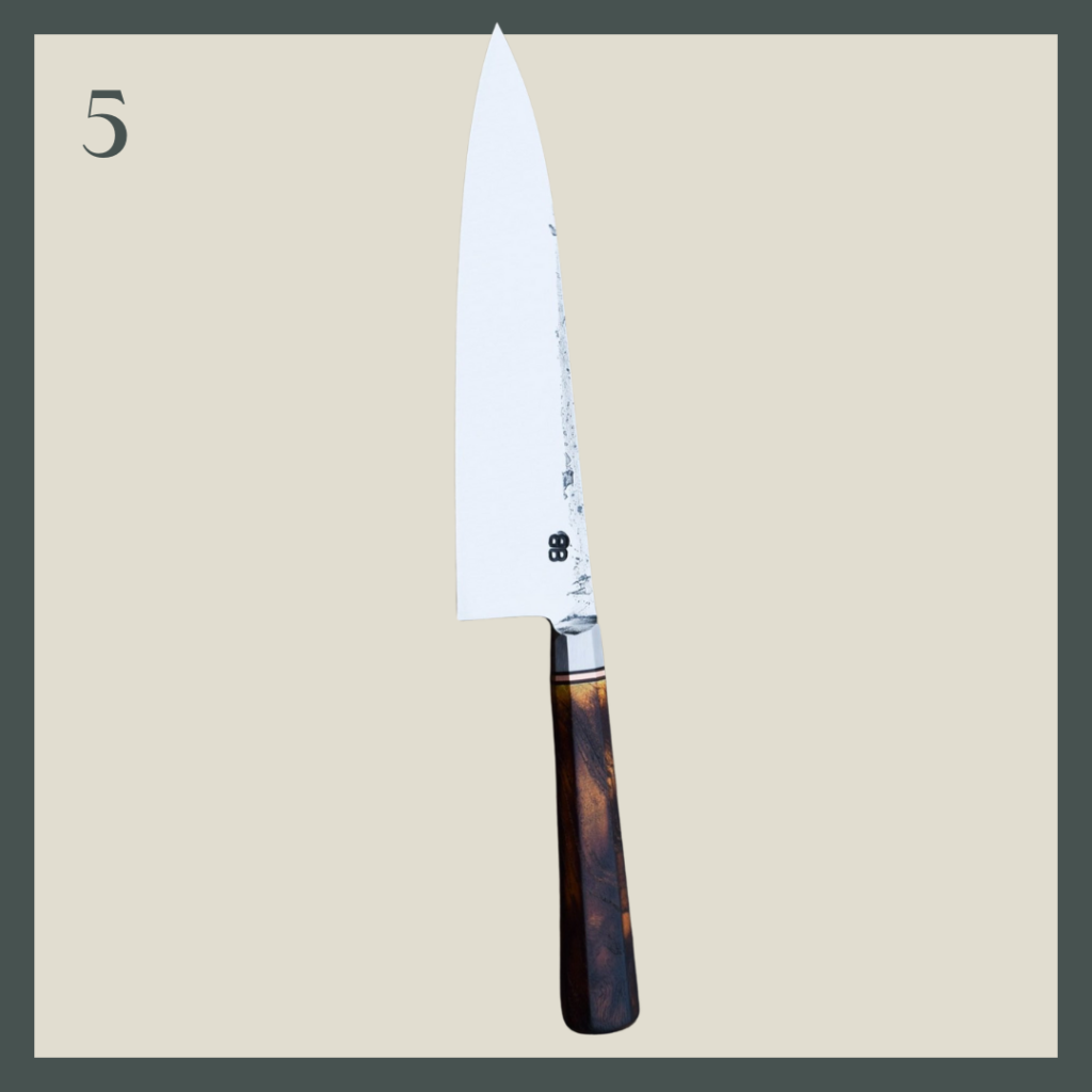 A beautiful chef's knife with tortoiseshell handle