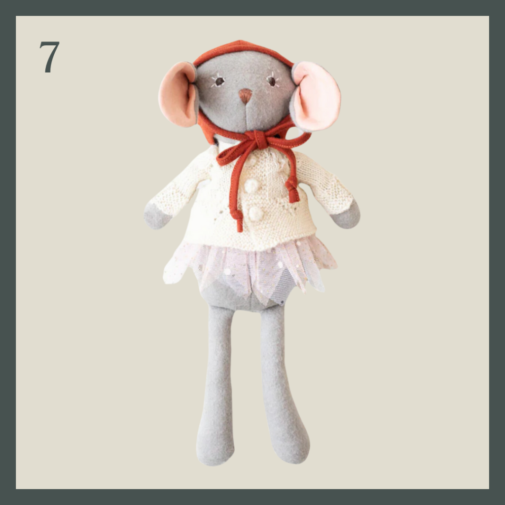 A handmade mouse stuffed animal with bonnet and cardigan