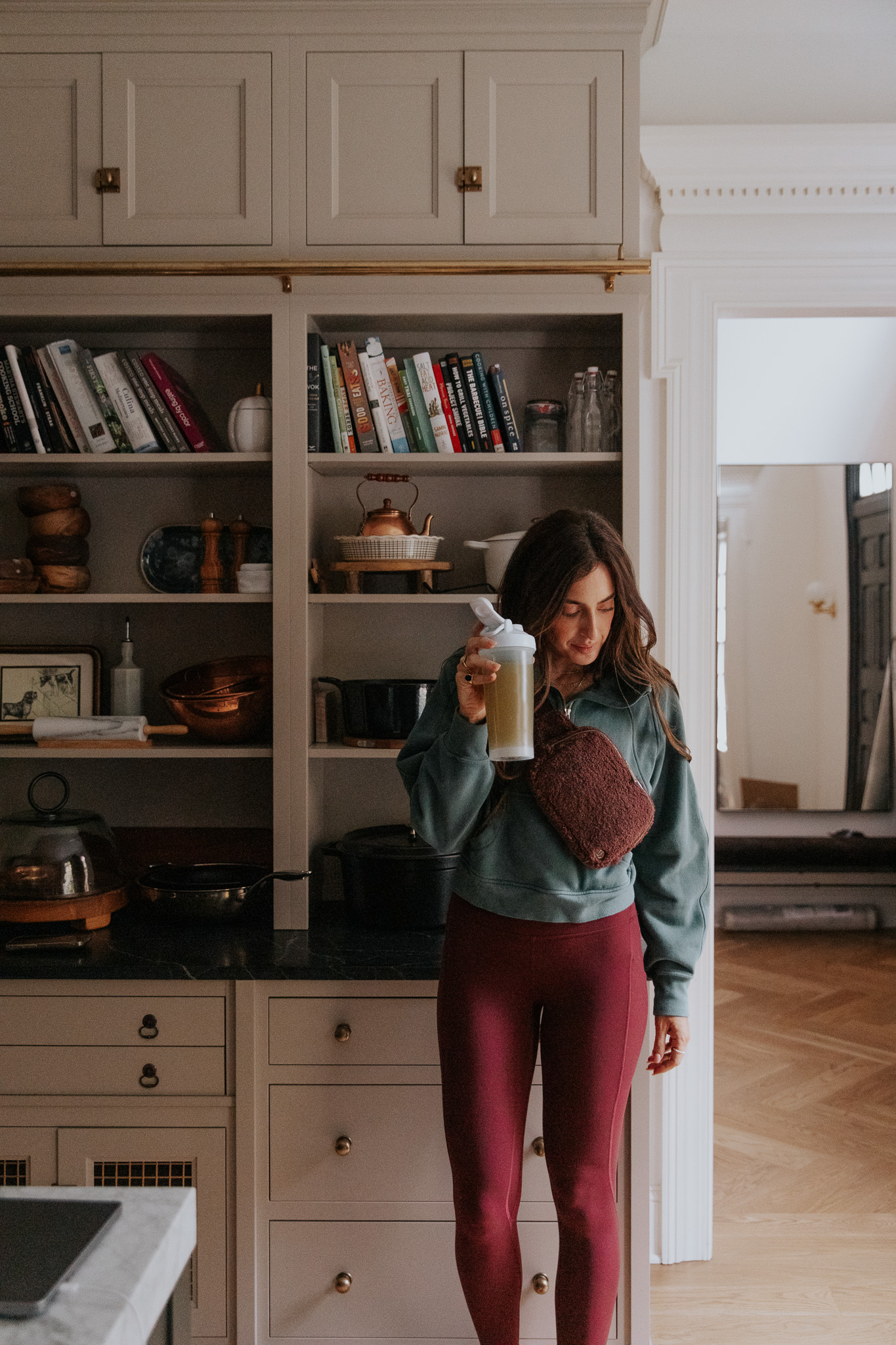 Julia holding a shaker bottle of water