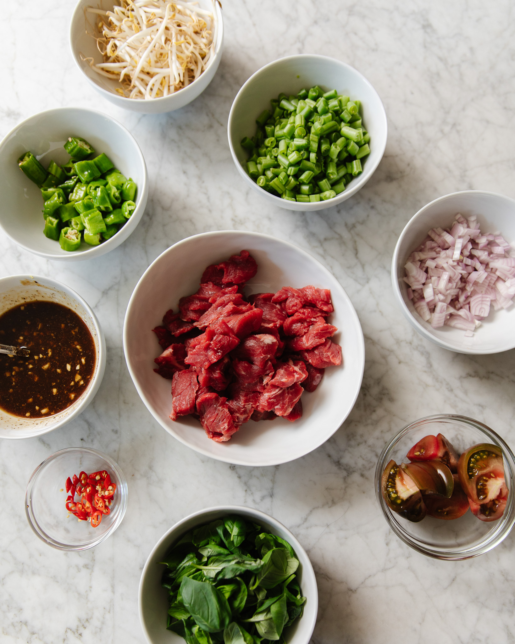 A flat-lay of the ingredients for Thai-Inspired Basil Beef Stir-Fry