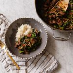 A bowl of Thai-Inspired Basil Beef Stir-Fry with jasmine rice