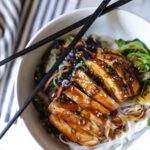 Teriyaki chicken bowl with chopsticks on the bowl