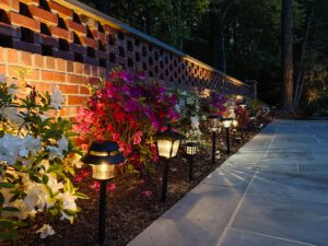 Solar path lighting at dusk with next to a walkway
