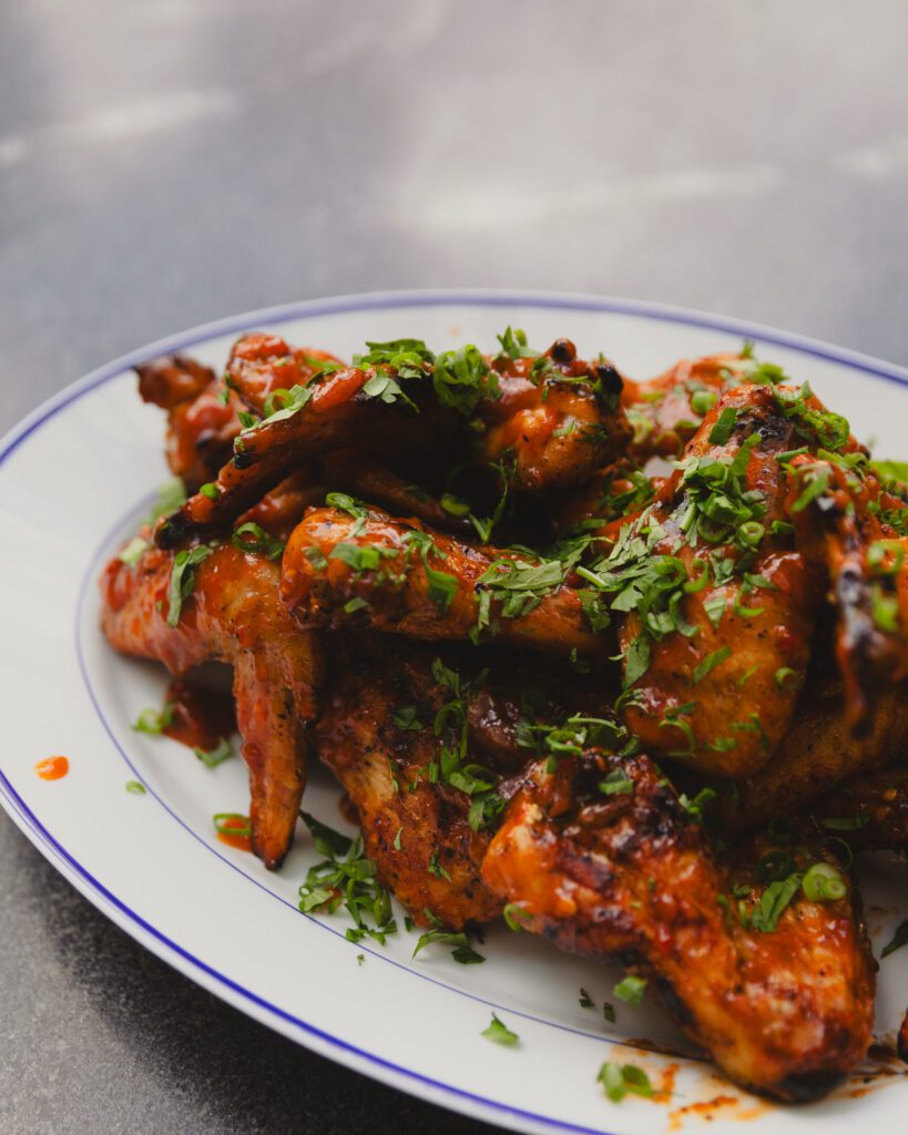 A platter of perfectly grilled chicken wings for summer entertaining