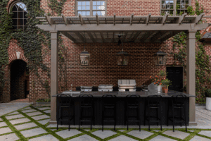 Pergola over the outdoor kitchen with polycarbonate roofing