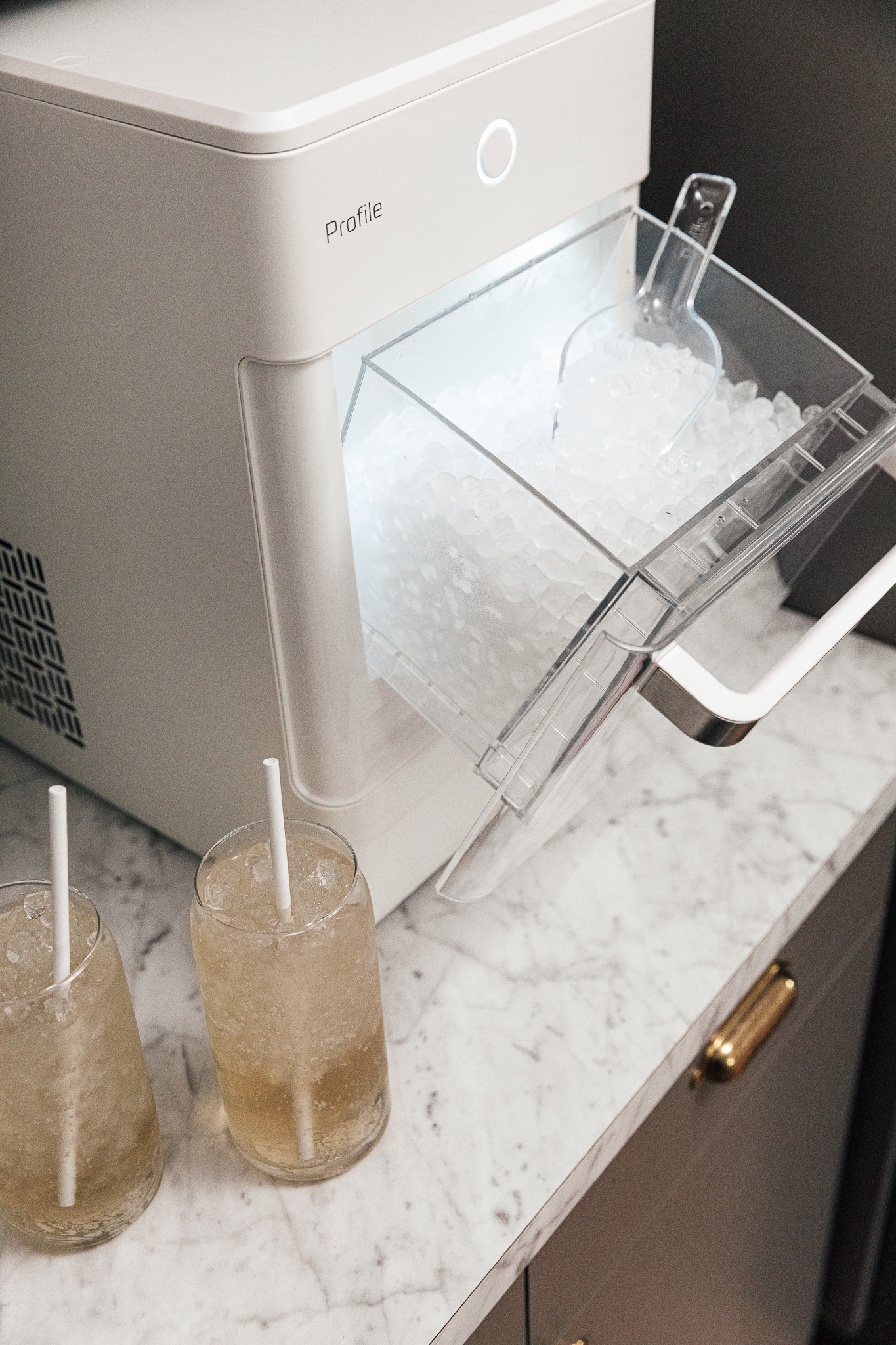 GE Opal by Hearth & Hand with Magnolia nugget ice machine open to show the container filled with ice
