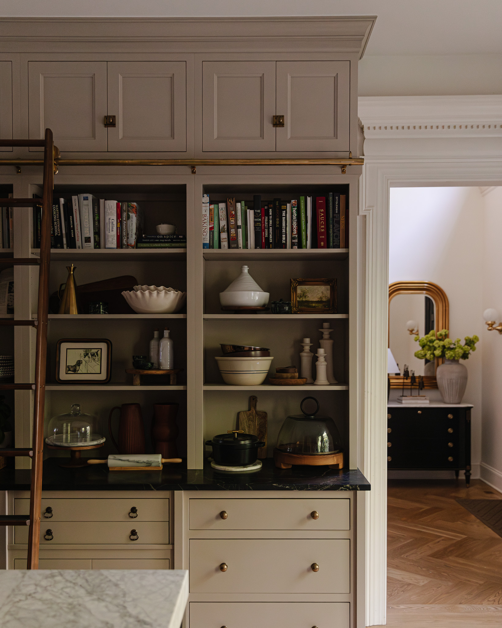 Built-in kitchen shelves styled with functional decor