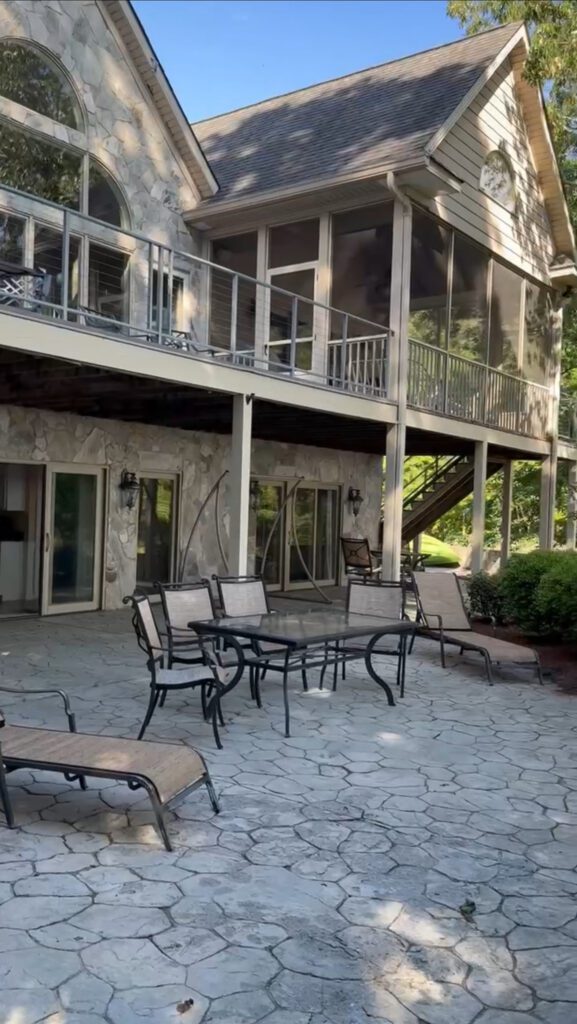 The back patio of a lake house