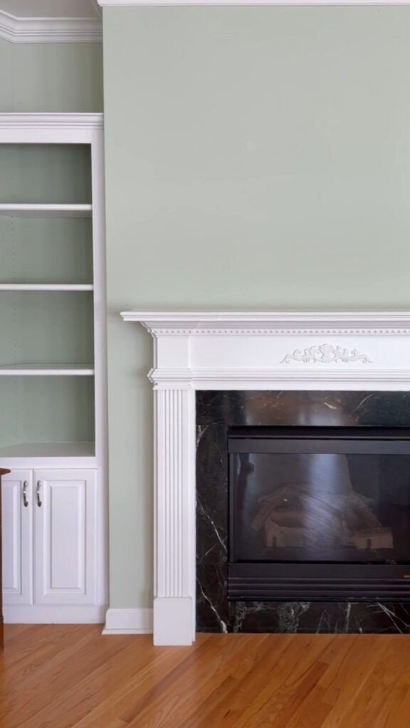 Details of the fire place and built-ins with warm wood floors in the lake house