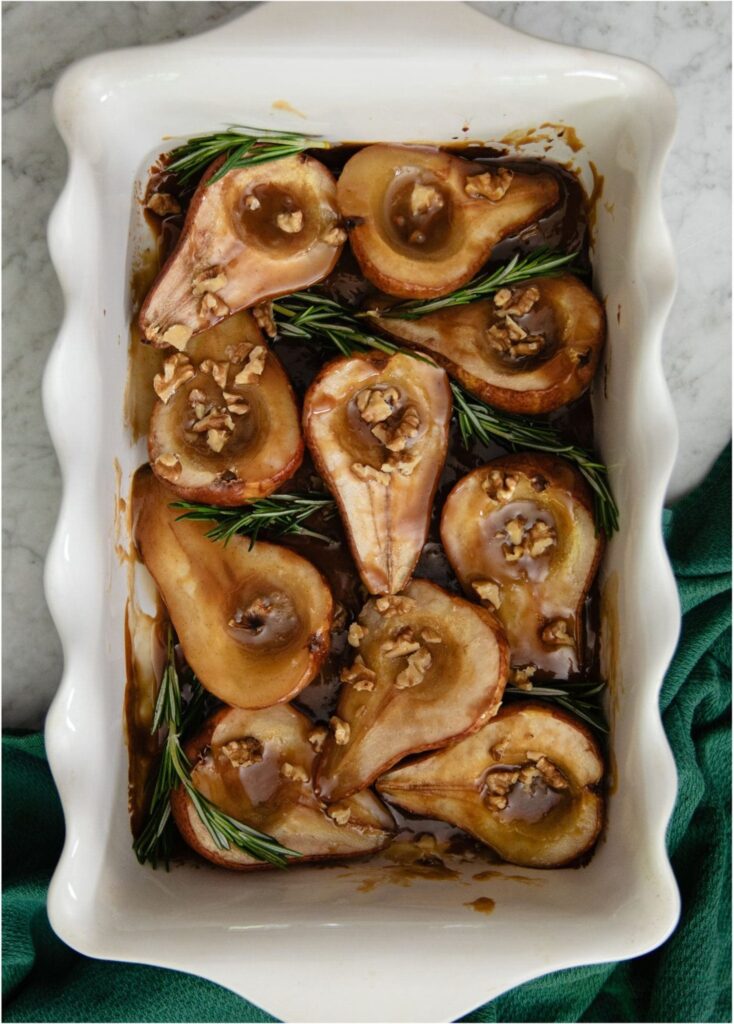 Rosemary pears in a scalloped casserole dish