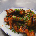 Chicken wings with sriracha pineapple glaze