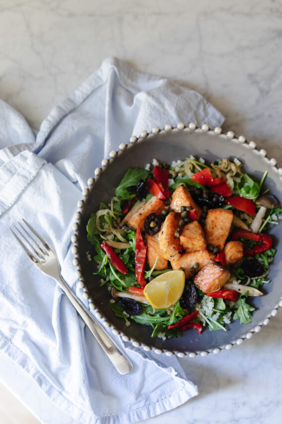 Mediterranean-Inspired Salmon Bowls on a counter