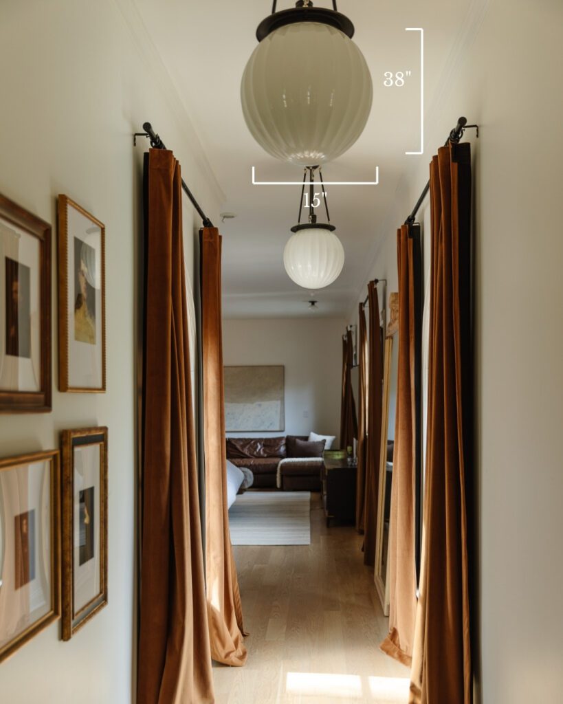 A moody modern traditional hallway with semi-flush pendant lights