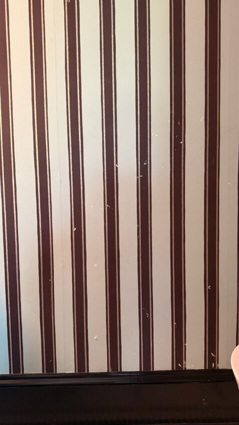 Striped wallpaper peeling off