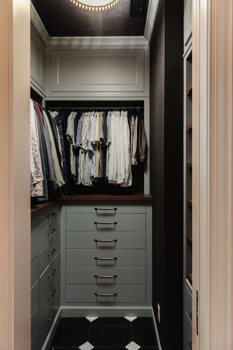 Closet organization with built-in drawers and hanging space, featuring stylish cabinetry and modern handles, ideal for maximizing storage in home design by Chris Loves Julia.