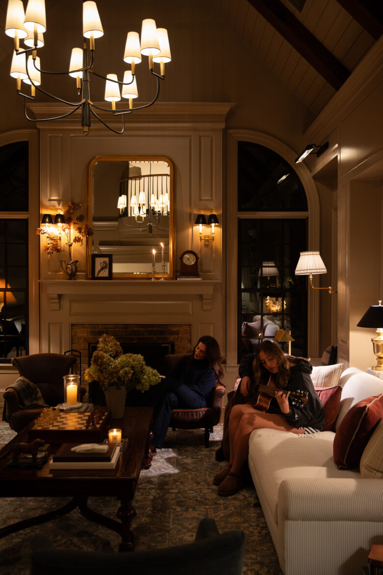 Charming interior of a warmly lit living room with vintage accents and cozy furniture, highlighting stylish home decor