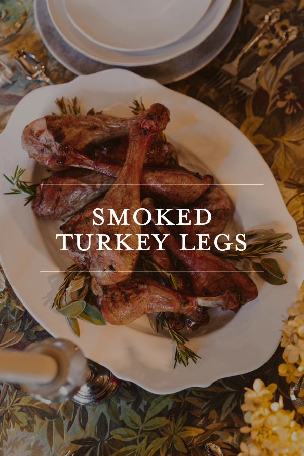 Smoked turkey legs as a savory festive dish on a Thanksgiving tablescape