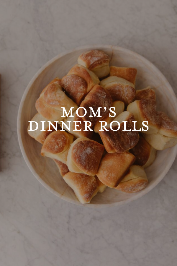 Fluffy homemade dinner rolls in a bowl, perfect for family meals and comfort food, easy to make from scratch, soft and buttery, ideal for Thanksgiving, Christmas, or everyday dinners.
