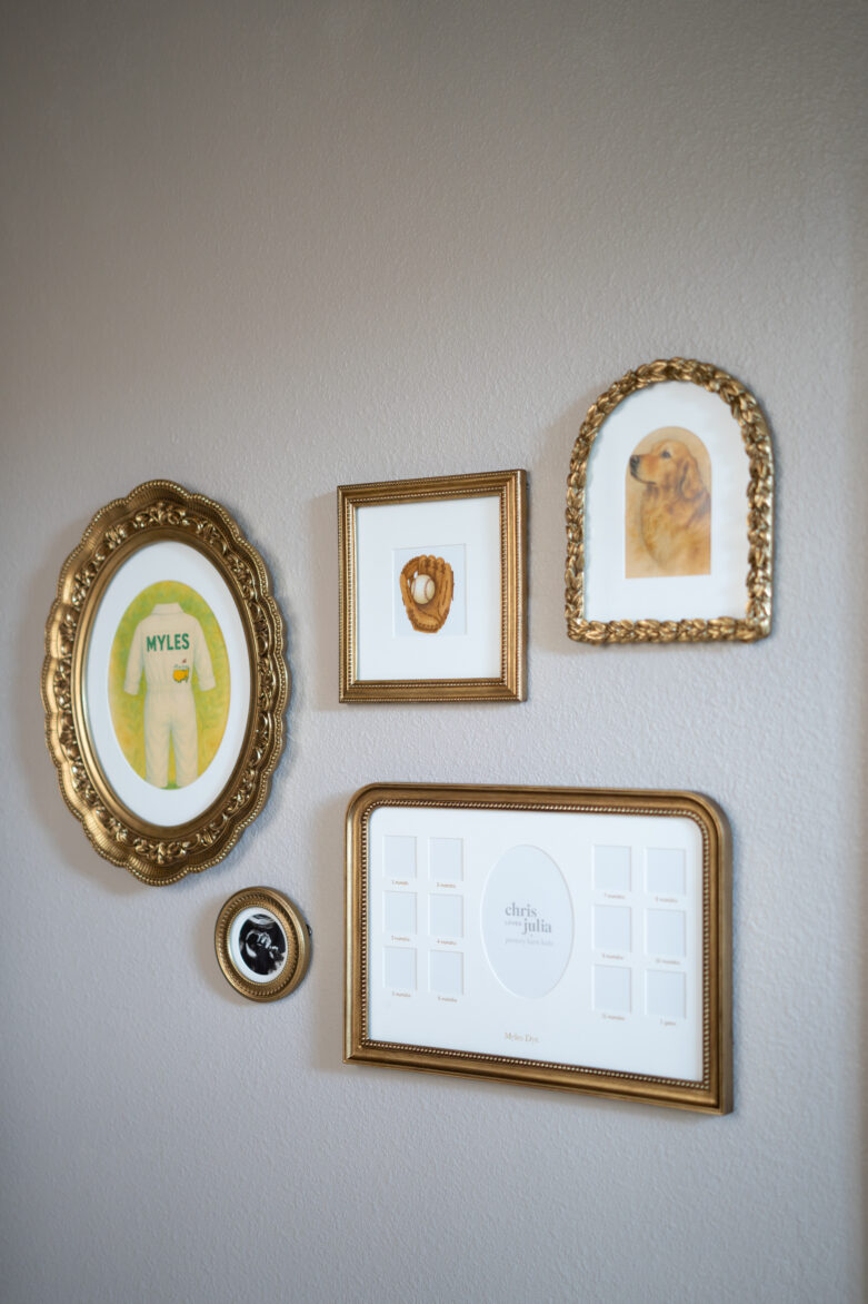 Elegant wall display featuring framed artwork, family photos, and personalized decor in gold frames for stylish interior design.