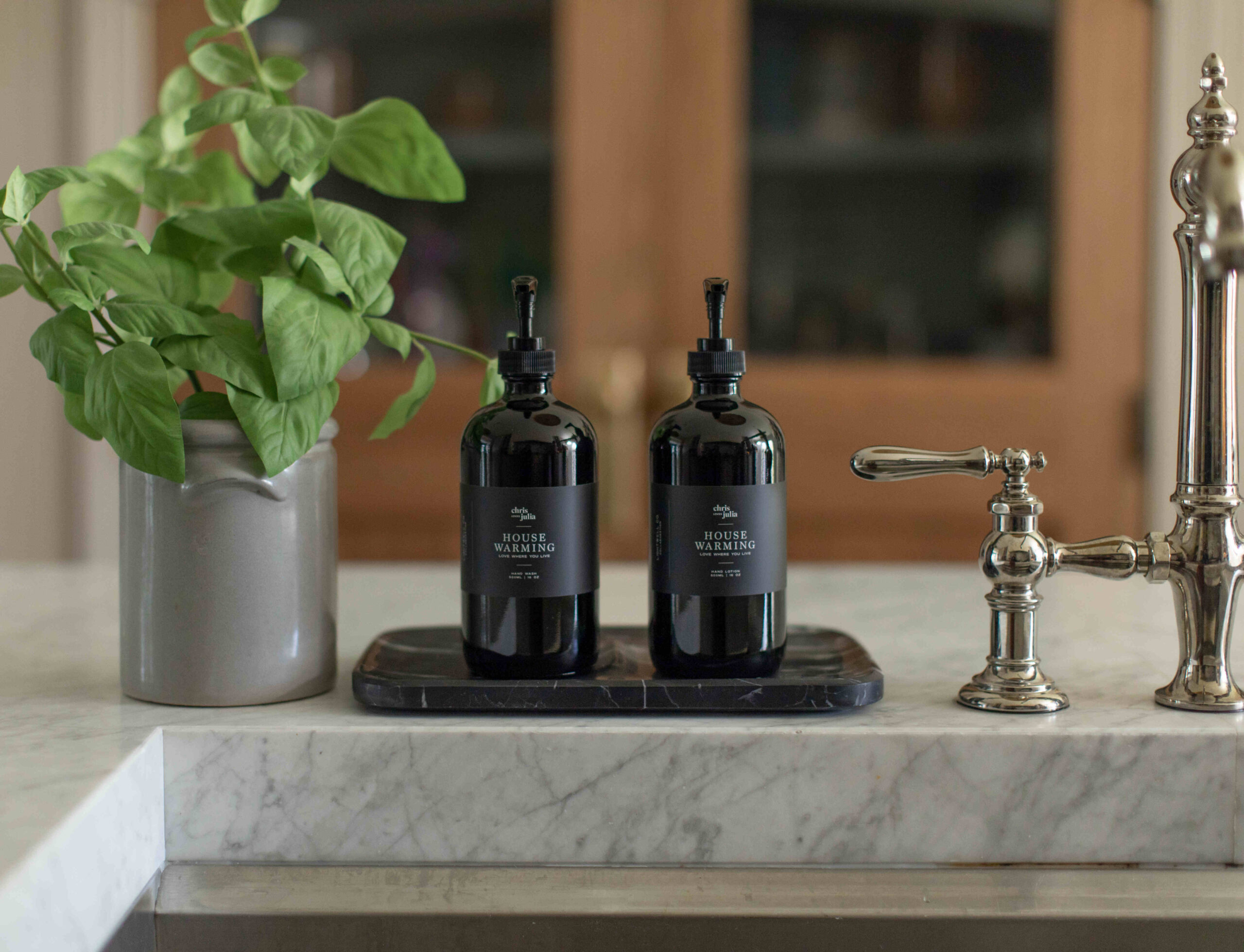 Lightwell x Chris Loves Julia Hand Soap and Lotion on the Kitchen counter
